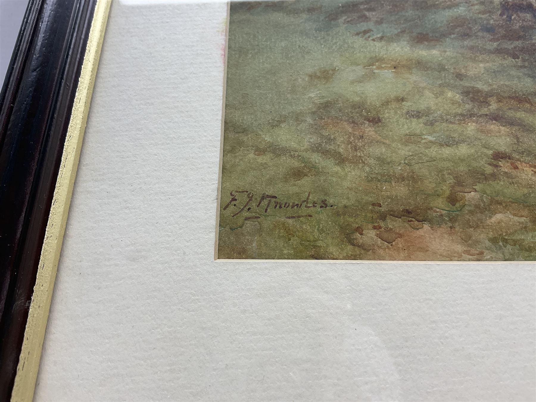 Frederick James Knowles (British 1874-1931): Calves by a Farmstead, watercolour signed 29cm x 40cm