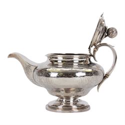 Victorian silver teapot, the body of bulbous form engraved with named cartouche and surrounded by flower heads and foliate scrolls, with capped strap handle with ivory insulator, and melon foliage mounted finial to the hinged lid, upon a circular stepped foot, hallmarked Francis David Dexter, London 1841, H17cm

This item has been registered for sale under Section 10 of the APHA Ivory Act