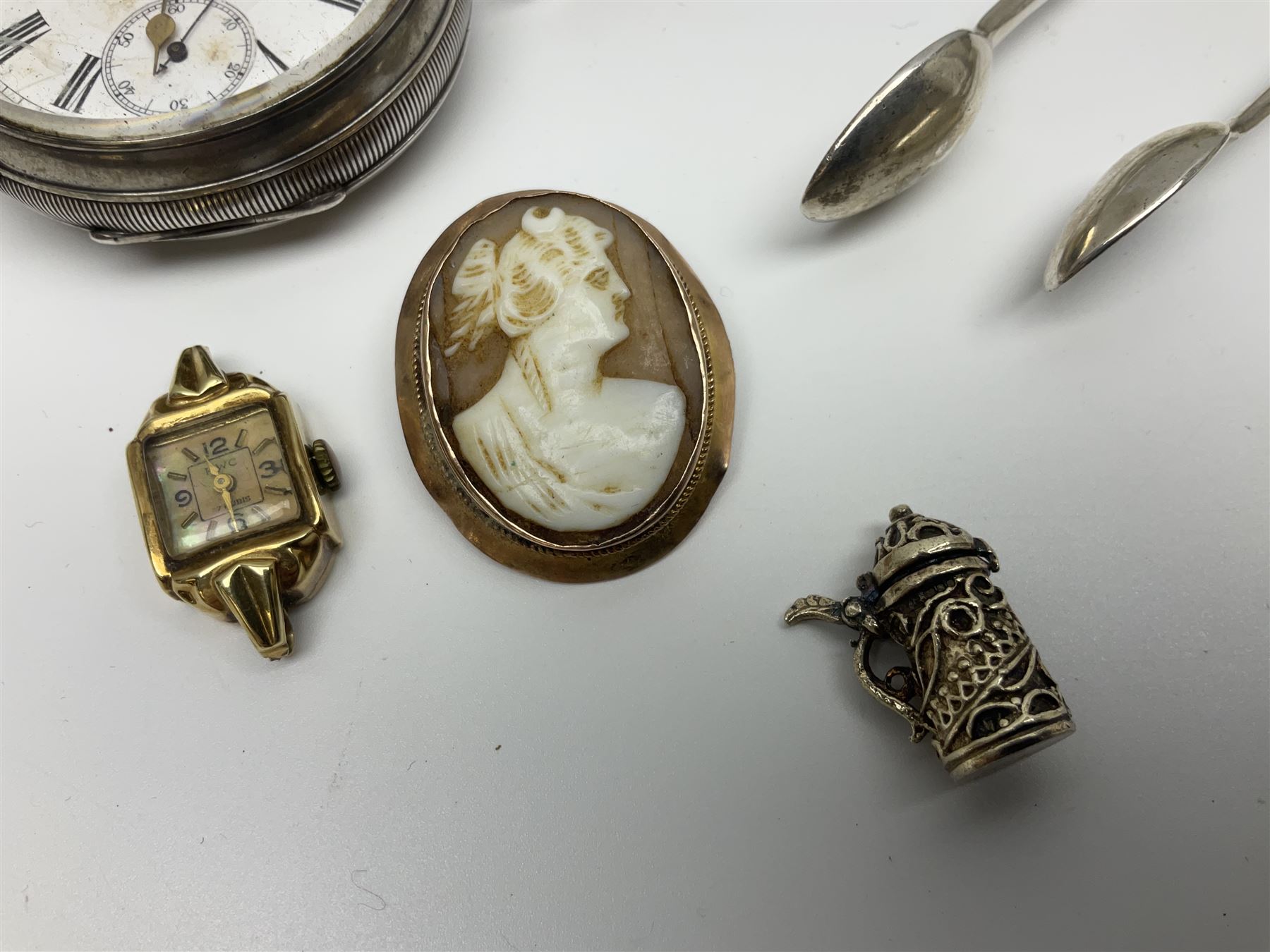 Edwardian silver open face lever pocket watch, case by Alfred Wigley, Birmingham 1901, on silver tapering Albert chain, 14ct gold ladies manual wind wristwatch, two pairs of silver sugar tongs by Francis Higgins II, London 1880, silver charm and a 9ct gold cameo