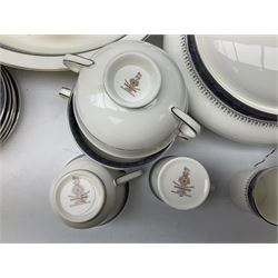 Royal Doulton tea and dinner wares decorated in the 'Sherbrooke' pattern,.to include two lidded tureens, twin handled soup bowls, coffee cans, dinner plates etc