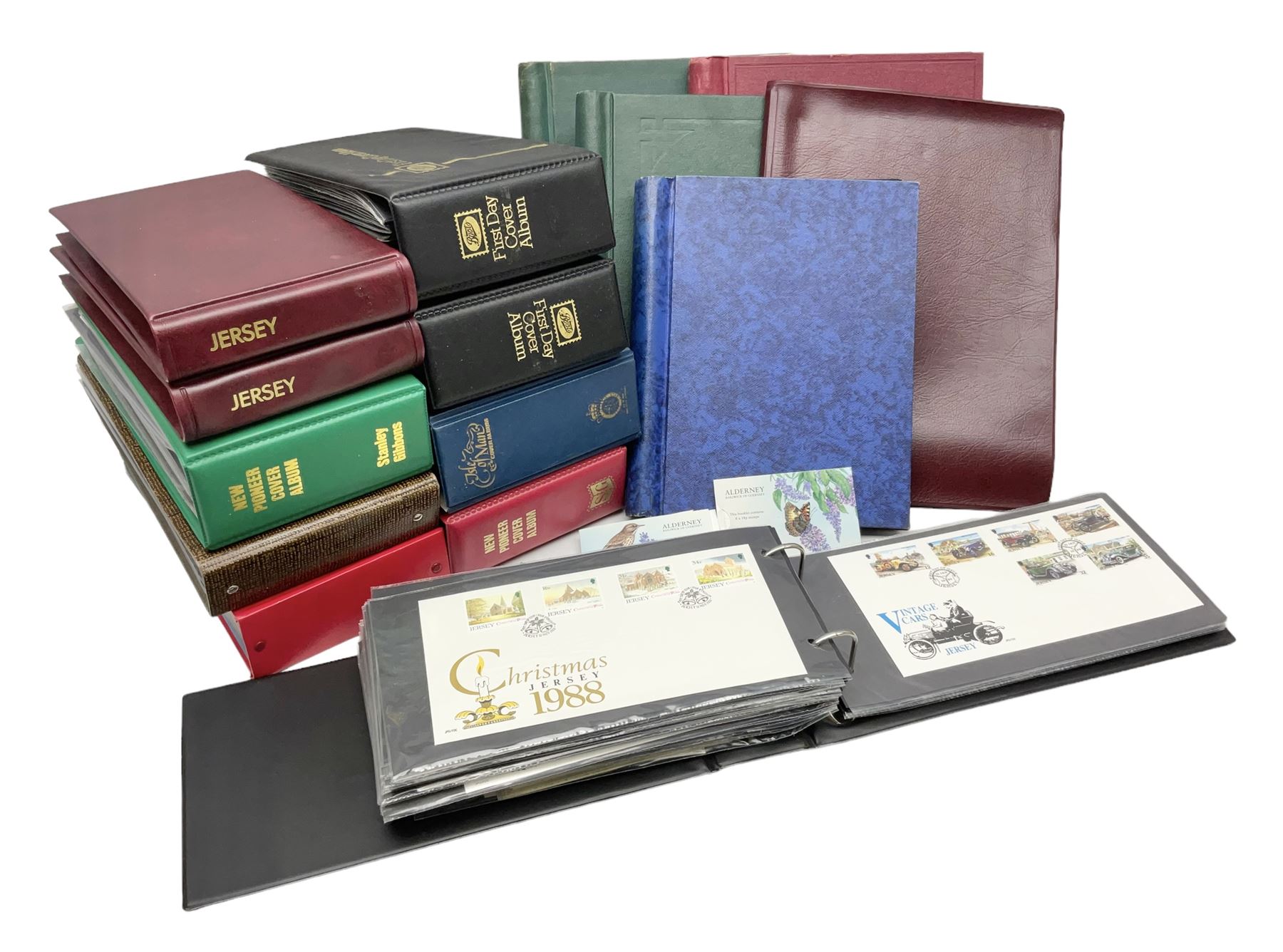 Stamps including Ilse of Man, Guernsey, Jersey and Great British first day covers, some with special postmarks, various air mail items etc, housed in fifteen albums / folders, in one box
