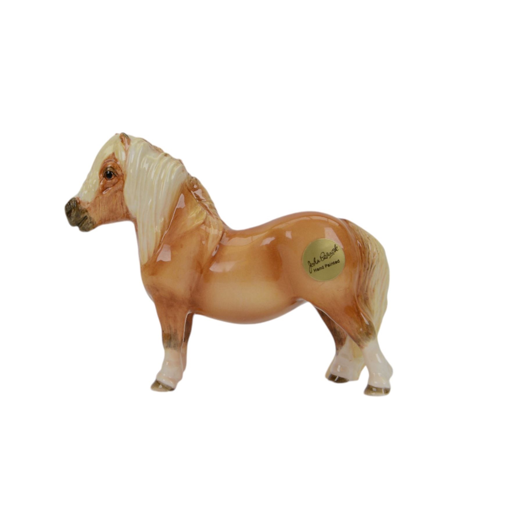 Three Beswick Horses, comprising skewbald Pinto Pony no 1373, Palomino horse and Palomino shetland