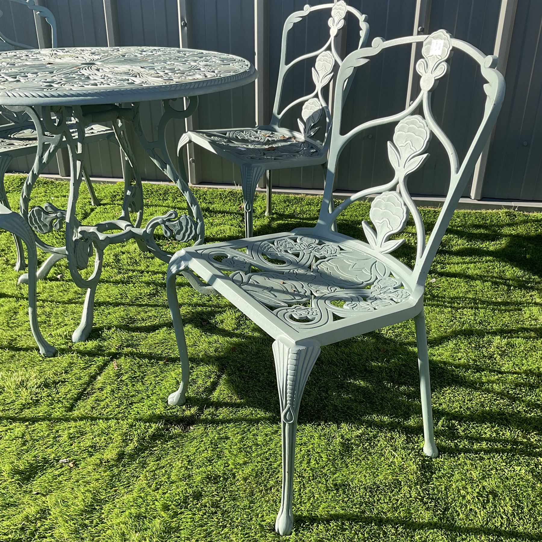 Painted cast aluminium circular garden table, and four chairs - THIS LOT IS TO BE COLLECTED BY APPOINTMENT FROM DUGGLEBY STORAGE, GREAT HILL, EASTFIELD, SCARBOROUGH, YO11 3TX