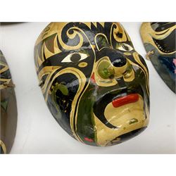 Five Japanese theatre / opera masks, the papier-mâché traditionally painted in the Noh Kabuki style, L18cm