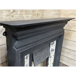 The Gallery Collection Fireplaces - 'Edwardian' cast iron fireplace, the hood decorated with interlacing floral design, with Art Nouveau inspired upright tiles