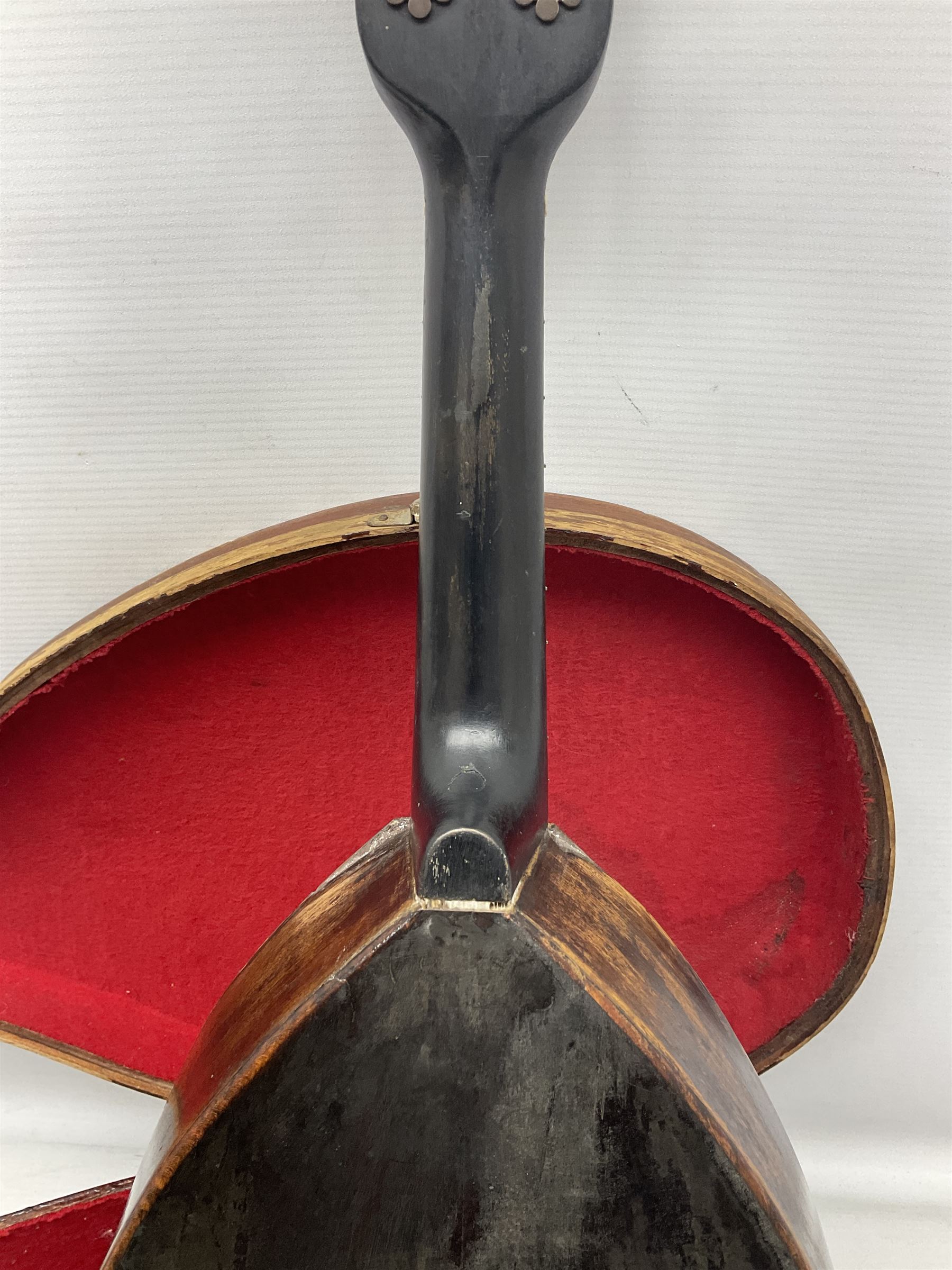 Early 20th century Italian Rafaele Disantino eight-string mandolin with two-piece back and spruce top with stamped Rafaele Disantino signature; bears maker's label L61cm; in wooden carrying case