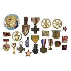 Five WW1 French medals comprising Medaille Militaire Gallantry Award, two Croix de Combattant, Medaille Commemorative Francais 1914-18 and a Patriotic Medal; together with small quantity of Russian badges etc