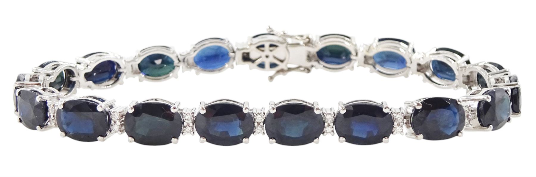 18ct white gold oval cut sapphire and round brilliant cut diamond bracelet, stamped, total sapphire weight approx 29.50 carat, total diamond weight approx 0.45 carat