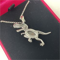 Silver Baltic amber dinosaur pendant necklace, stamped 925 