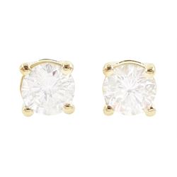 Pair of 18ct gold round brilliant cut diamond stud earrings, stamped, total diamond weight approx 0.80 carat