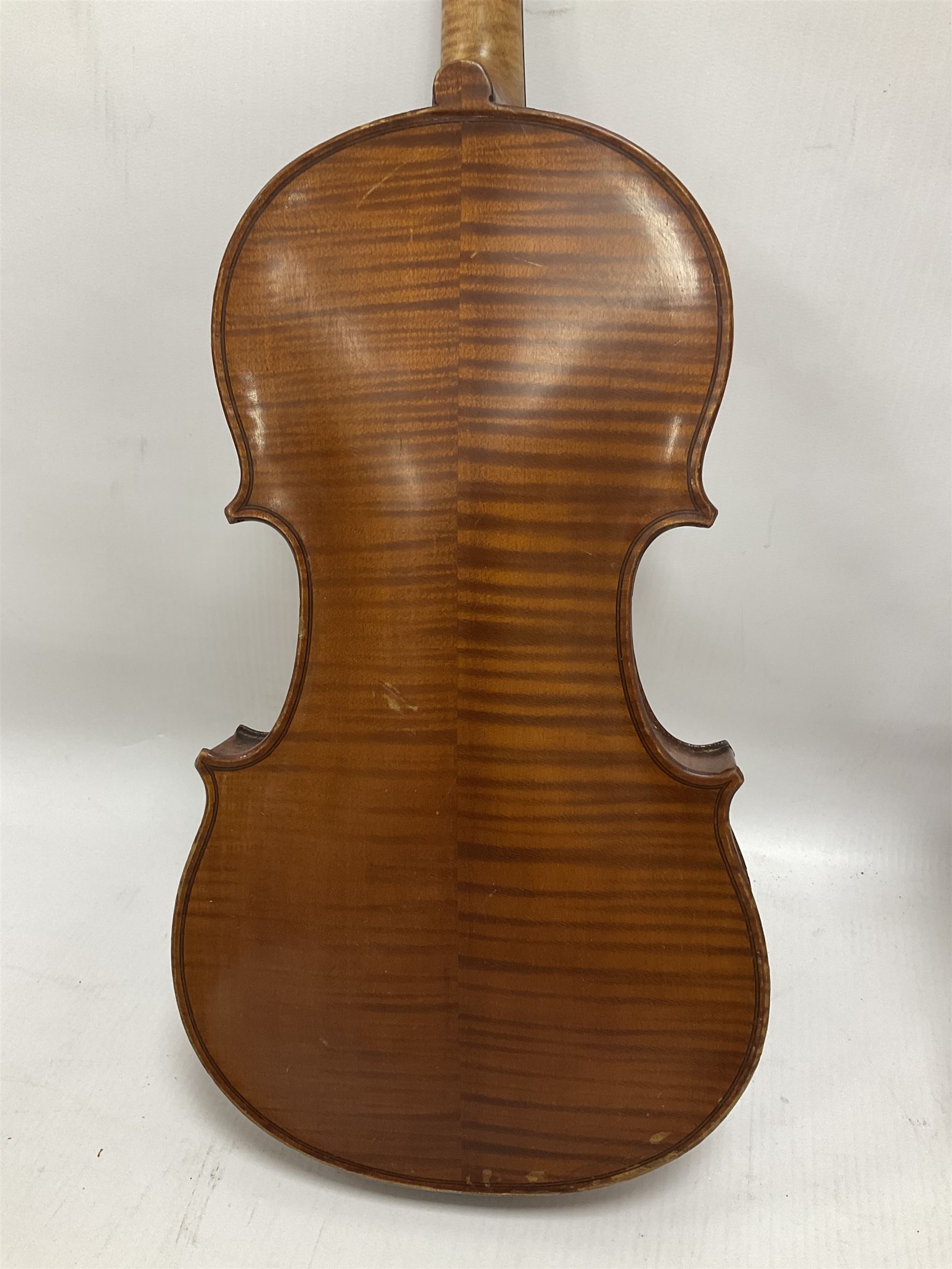 Four violins 1/8th size; half size with Nicolas Bertholini label; three-quarter size with Stradivarius copy label; and full size with Marquis De L'Air label (4)