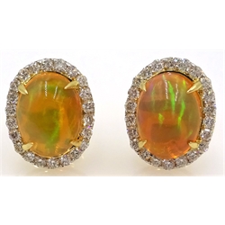  Pair of fire opal and round brilliant cut diamond gold (tested 18ct) stud ear-rings, opals 2.8 carat, diamonds 0.65 carat  