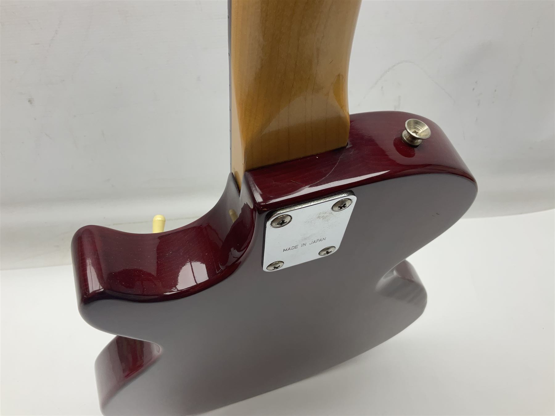 Gibson Marauder style six-string electric guitar with cherry coloured body, marked made in Japan L101cm; in locking hard carrying case