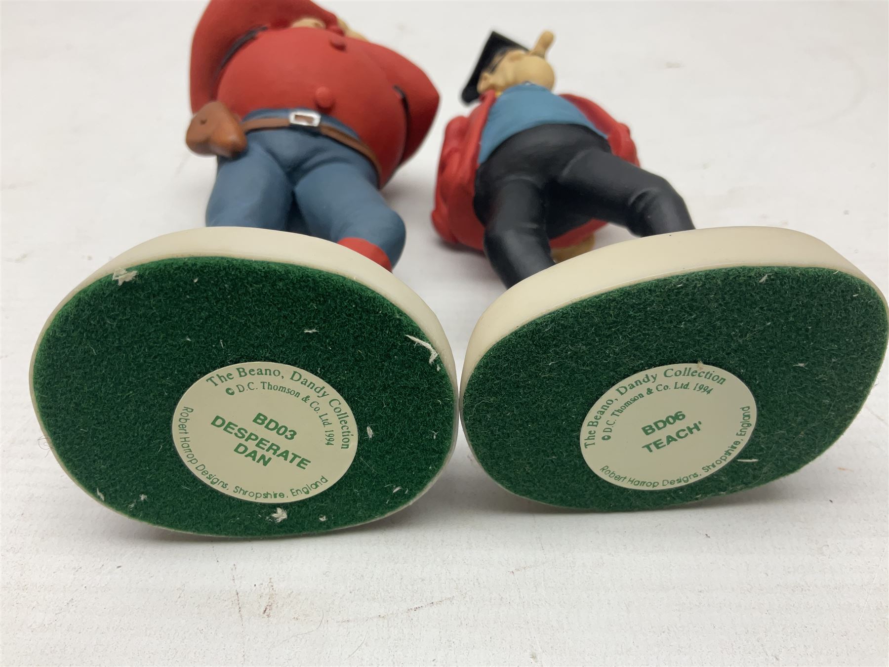 Thirteen Robert Harrop figures from the Beano Dandy collection, comprising Yo-Yo Collectors Piece 1996, Desperate Dan BD03, Cuthbert Cringeworthy BD08, Teach BD06, 'Erbert BD14, Toots BD12, Winston BD17, Fatty BD07, Dennis The Menace BD01, Dennis the Menace Fishing BD806, Sydney BD13, Wilfrid BD15 and Plug BD11