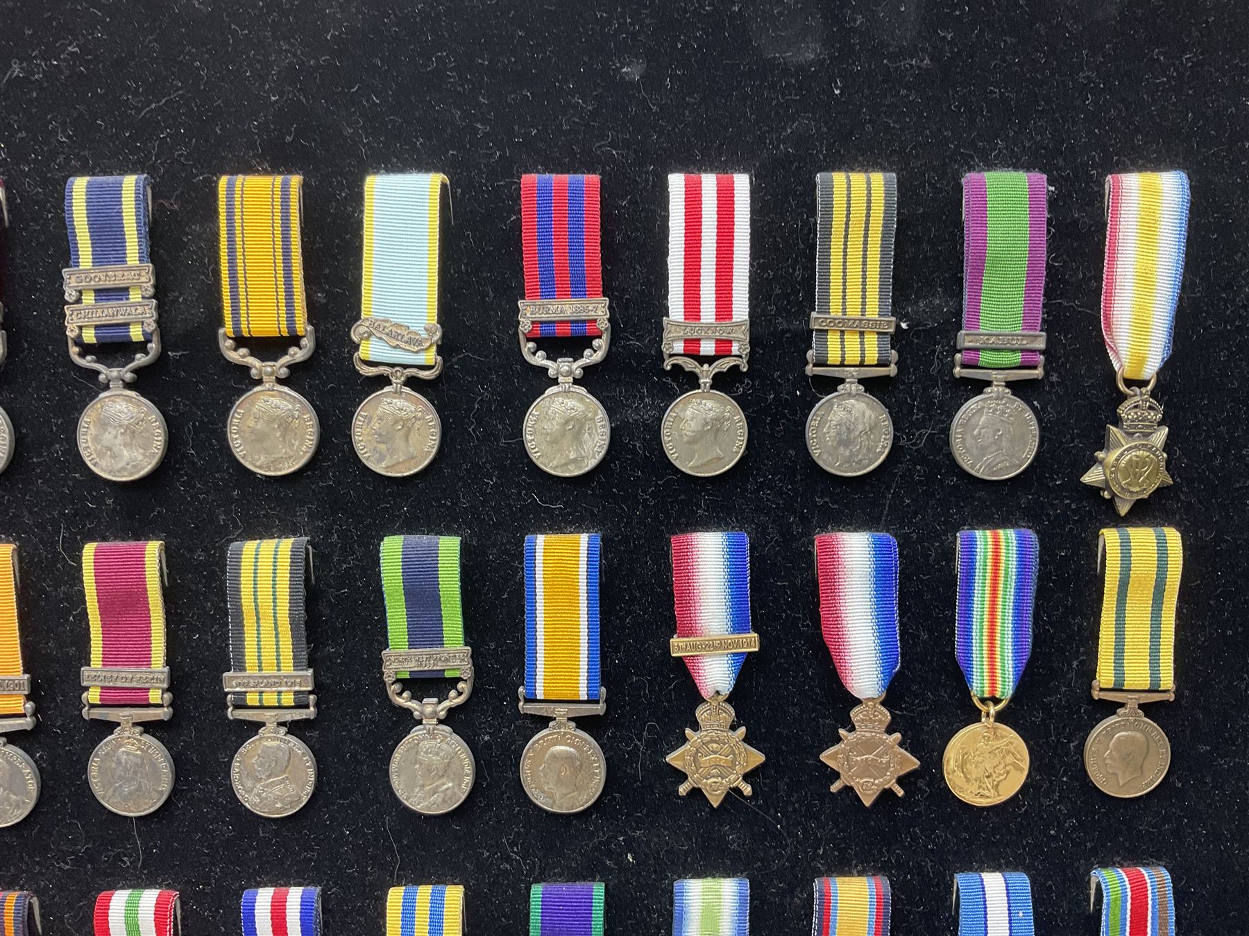 Two limited edition large framed display boards with half-size copies of British Gallantry and Campaign Medals produced by Danbury Mint and entitled 'For Valour'. Sixty medals on each board, all with ribbons. Complete with Danbury Mint certificate serial number A0148 and other paperwork.