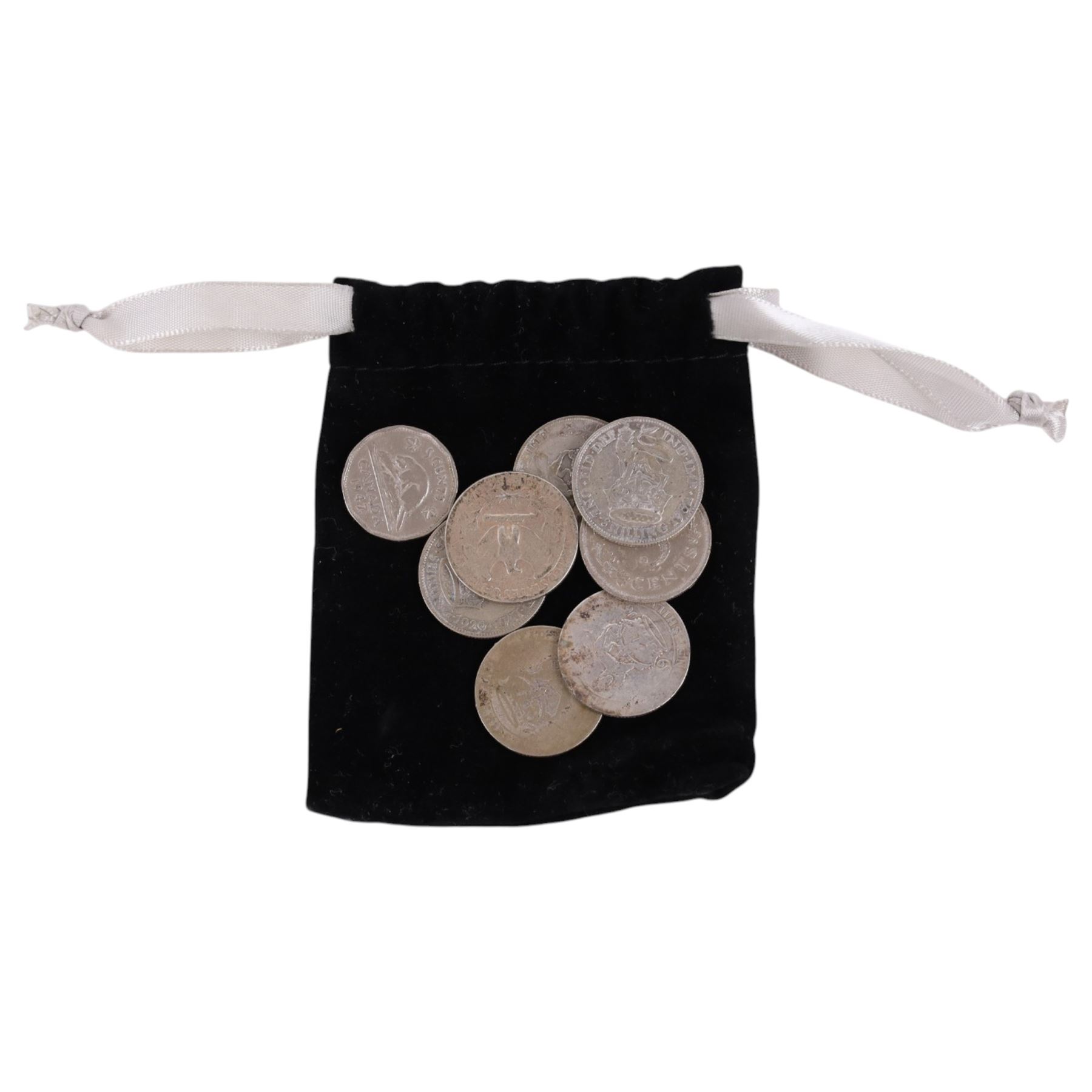 German silver beaker (800 standard), silver plated trophy cup, silver pocket watch, gold plated screw back pocket watch, five silver shilling coins, and some further coins