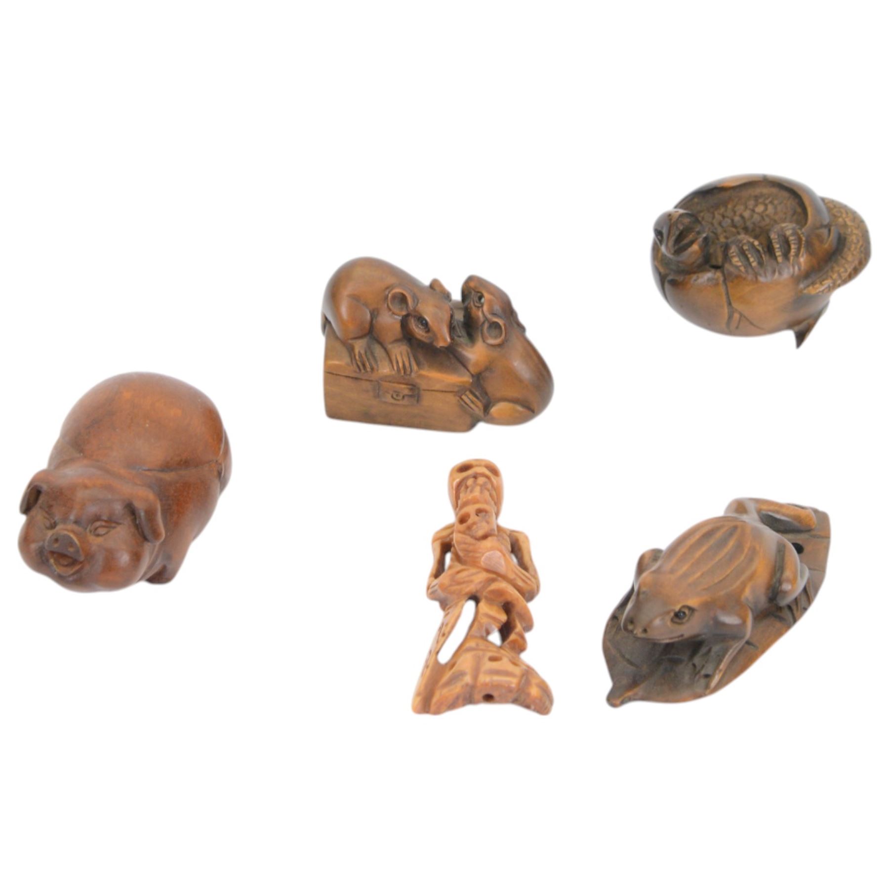 Ten carved wooden netsuke, including pig, rabbit, rats, frog etc 