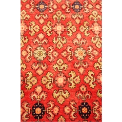  Persian red ground rug, repeating field and border 325cm x 170cm  