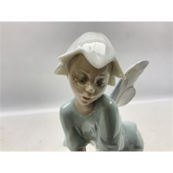 Lladro Privilege figure, Prince of Elves, modelled as an elf with wings leaning upon a rock, with original box, no 7690, year issue 2001, year retired 2003, H23cm