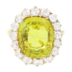 Early 20th century gold chrysoberyl and diamond cluster ring, single cushion cut yellow / ...