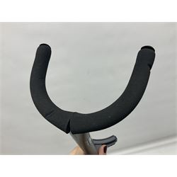 Four folding tubular guitar stands, two by RockJam; and folding tubular saxophone stand (5)