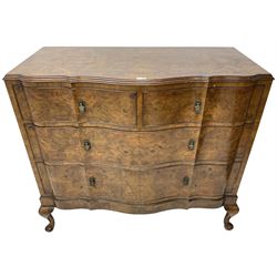 Early to mid-20th century figured walnut serpentine chest, moulded top over two short and two long cock-beaded drawers, fitted with drop handles in the form of shields with three recumbent lions, on cabriole feet
