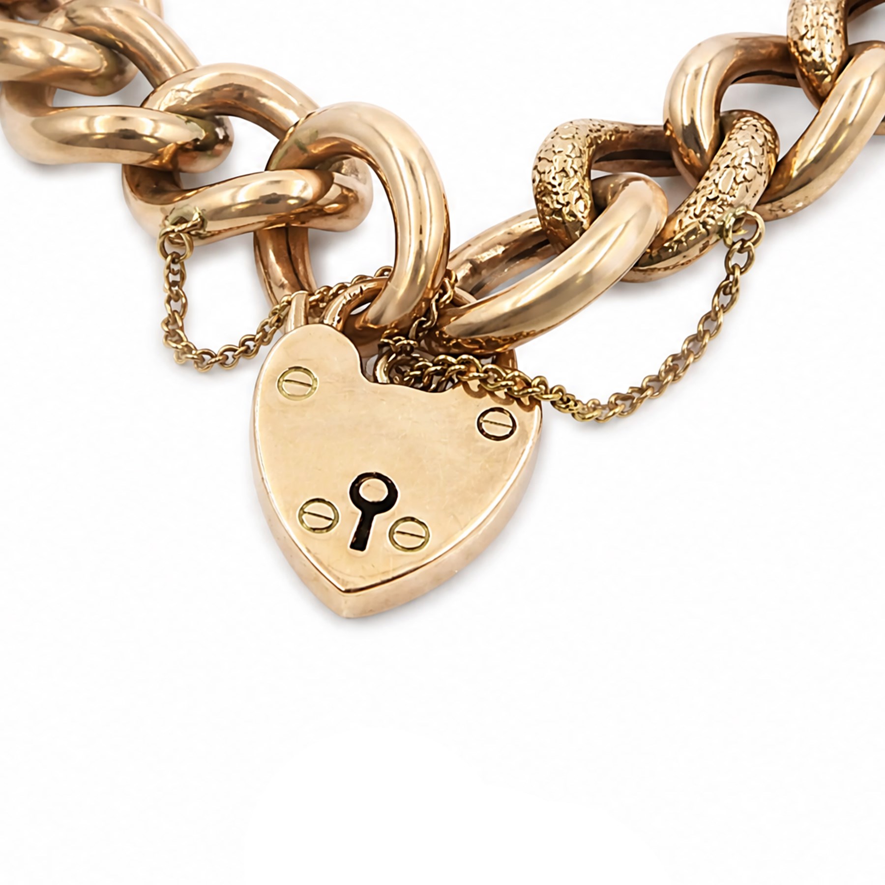 19th/ early 20th century rose gold bracelet, polished and embossed links with heart padlock clasp, stamped B&S 9ct
