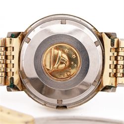 Omega Constellation gentleman's gold-plated and stainless steel automatic chronometer wristwatch, Ref. 168.004, Cal. 561, champagne dial with baton hour markers and date aperture, on Omega gold-plated bracelet, with fold-over clasp 