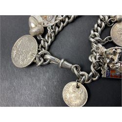Silver curb link charm bracelet, with fifteen charms including acorn, bear, telephone and coins etc