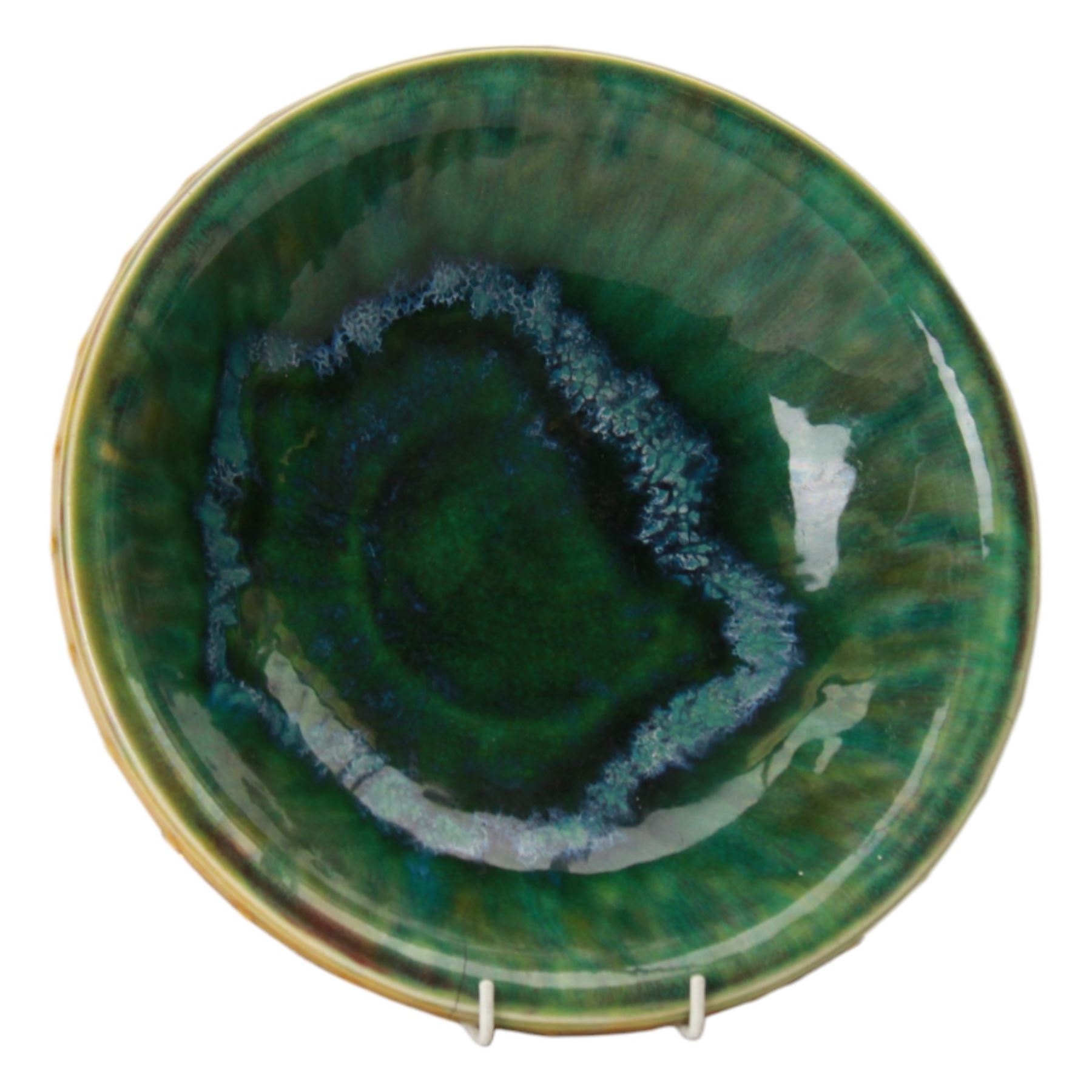 Christopher Dresser for Linthorpe; pedestal bowl, glazed brown to the exterior, the interior in blues and greens, with impressed mark 451 beneath, H8cm, D25cm