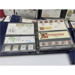 Mostly Great British first day covers, some with special postmarks, from the 1960s to the early 2000s and a small number of Queen Elizabeth II usable postage stamps, housed in eleven ring binder folders