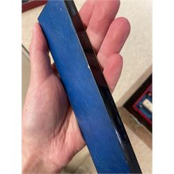 19th century walnut and brass bound games compendium box, painted to enhance the grain, of rectangular form, the hinged opening cover with rounded sides, central brass cartouche with engraved lion crest, and brass riveted straps, opening to reveal a red leather and blue silk lined compartmented interior, with fold-down games board, and lift-out tray containing playing cards, ebony turned dice towers, white and red stained bone draughts, and chess pieces, ivory dice, and ivory and ebony whist markers, and brass bezique board, cribbage board and markers, H15cm W32cm D24cm
This lot has been registered for sale under Section 10 of the APHA Ivory Act