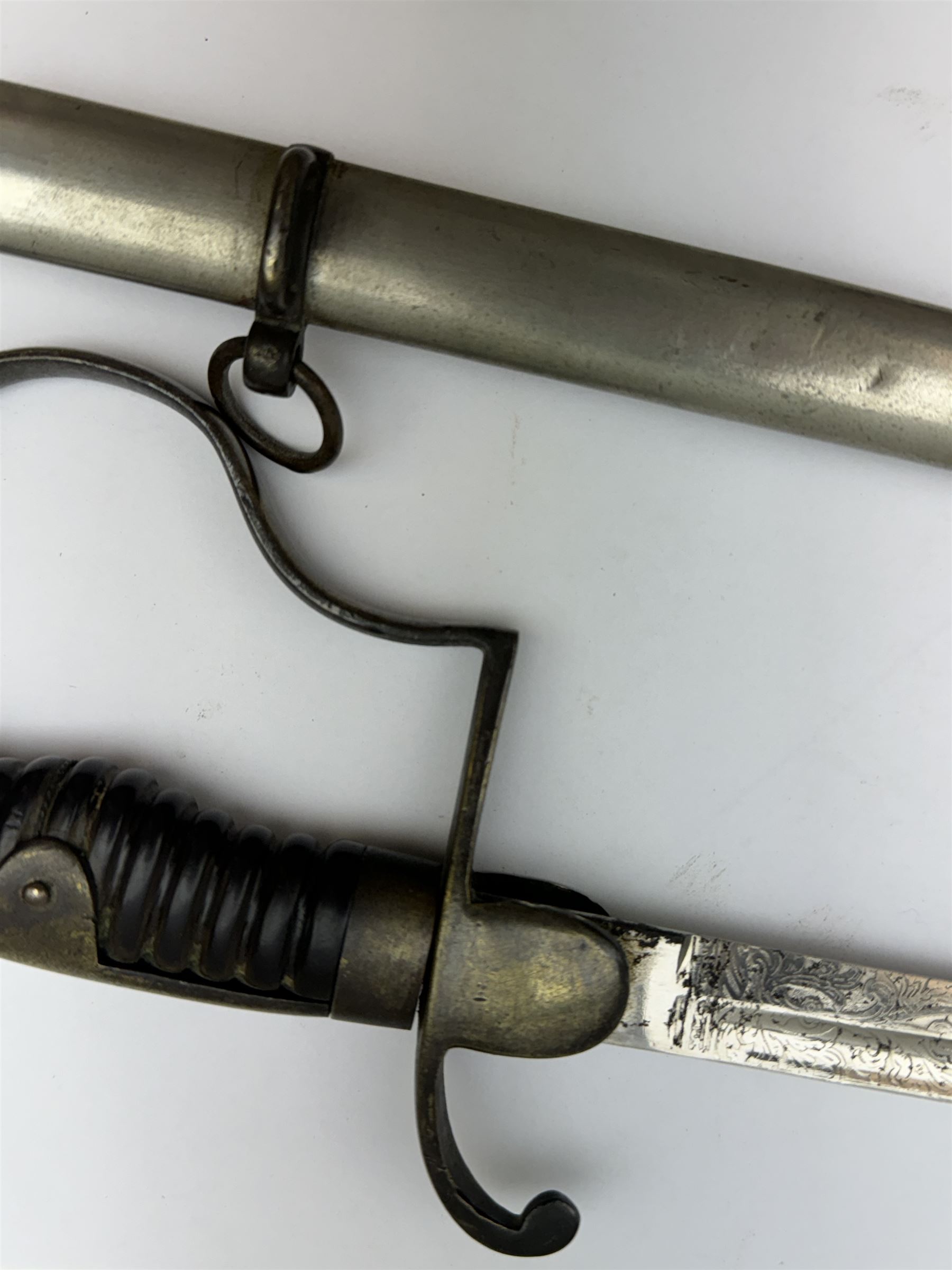 Ottoman/Turkish WW1 Period Infantry Officer's Short Sword,  the single edge fullered steel blade etched with a martial trophy, star and crescent, L73cm, the rib etched Vahram Tagirian, with steel scabbard, L87cm