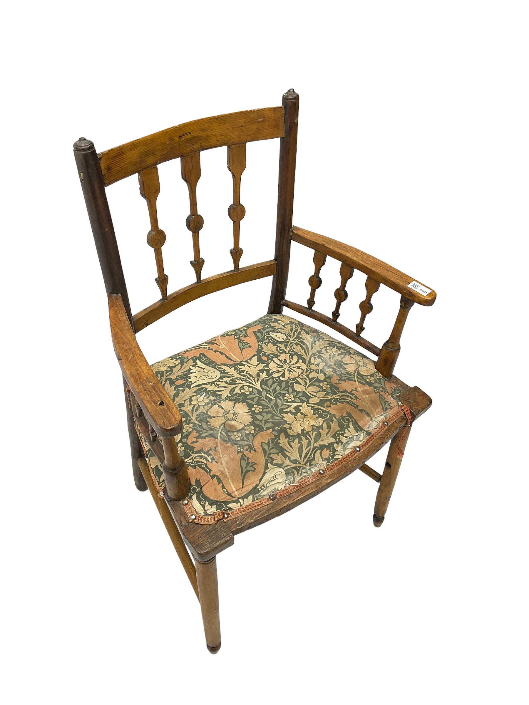 19th century ash and beech Sussex type elbow chair, the back and arms with arrow shaped vertical rails, upholstered seat, on turned supports