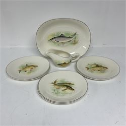 Wedgwood & Co. eight-piece fish service comprising six plates, sauce boat and larger serving plate