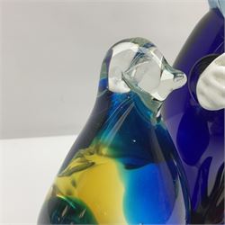 Murano glass clown, together with two glass penguin paperweights, clown H28cm