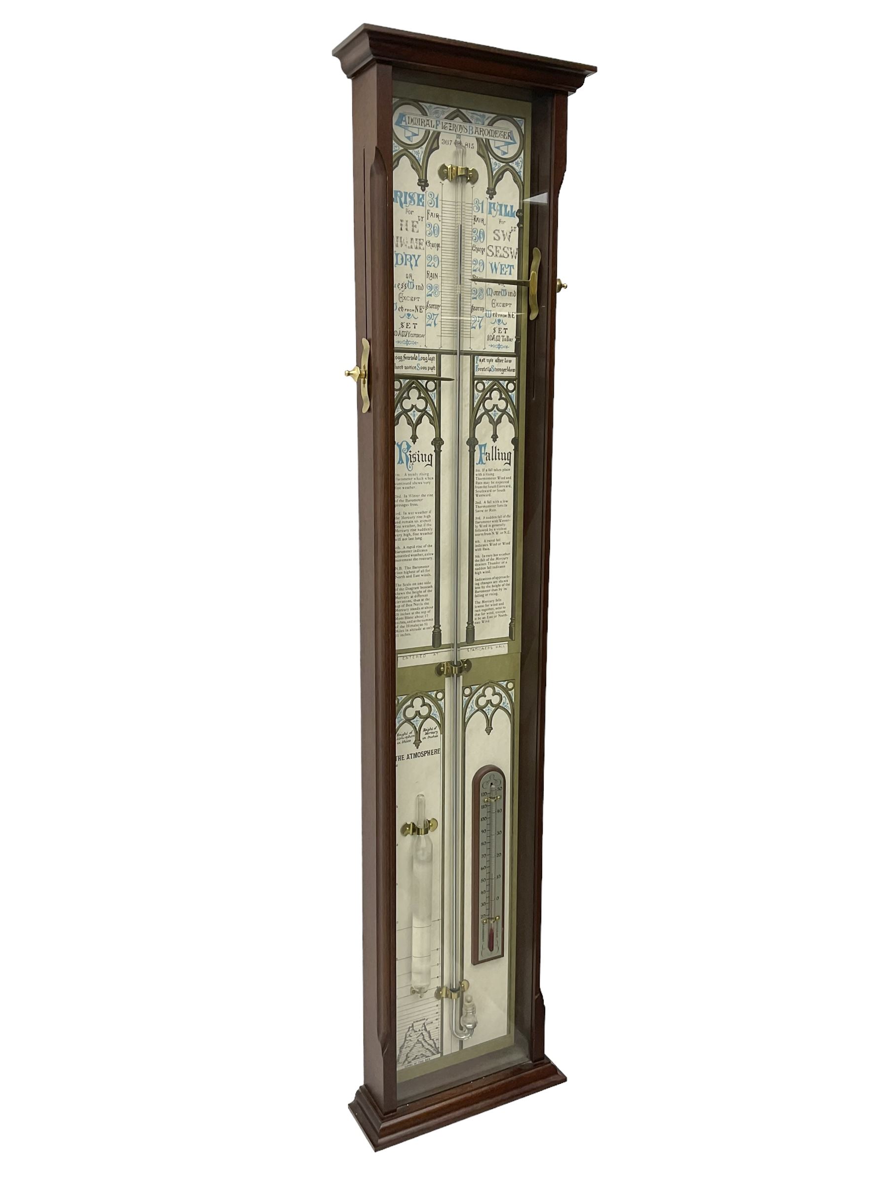 Comitti of London - 20th-century replica mahogany Fitzroy barometer, in a fully glazed case with full-sized Fitzroy charts and weather predictions, with two adjustable recording pointers, spirit thermometer and storm glass, barometric pressure recorded in inches, cistern tube in good condition and containing mercury.