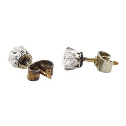 Pair of 18ct gold and platinum round brilliant cut diamond stud earrings, total diamond weight approx 0.60 carat