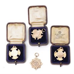 Four early 20th century 9ct gold sporting fob medallions, awarded to John Barugh Fisher (1...