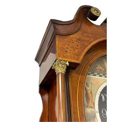 John Stonehouse of Leeds - mahogany 8-day longcase clock with a painted oval dial c1830, hood with a swans necked pediment and profuse contrasting inlay to both the hood and case, oval hood door with flanking pilasters and Corinthian capitals, conforming case with canted corners and short triple spire door, broad plinth with matching inlay and canted corners on shallow base, dial depicting masonic regalia, symbols, and pictorial depictions of the humanities, faith, hope, charity and righteousness, black chapter with white roman Arabic’s, date recorder and matching “crown” hands, dial pinned to a rack striking movement with a recoil anchor escapement, striking the hours on a coiled underslung gong. With weights and gridiron pendulum. 
This clock case is of large, impressive dimensions and was almost certainly commissioned for a large masonic lodge in Leeds, a rare and unique example.