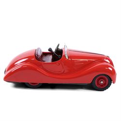 Schuco Examico 4001 tinplate clockwork car, in red with burgundy interior, with key and instructions, boxed