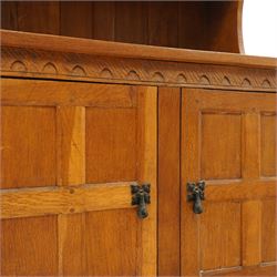 Gnomeman - adzed oak dresser, arcade carved cresting rail over two lead glazed doors, double cupboard below enclosed by two panelled doors, with carved gnome signature, by Thomas Whittaker of Littlebeck 