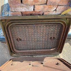 Two cast iron manhole drain covers with surrounds, 77cm x 61cm and 68cm x 55cm overall - THIS LOT IS TO BE VIEWED AND COLLECTED BY APPOINTMENT FROM THE CAYLEY ARMS, HIGH STREET, BROMPTON-BY-SAWDON, YO13 9DA