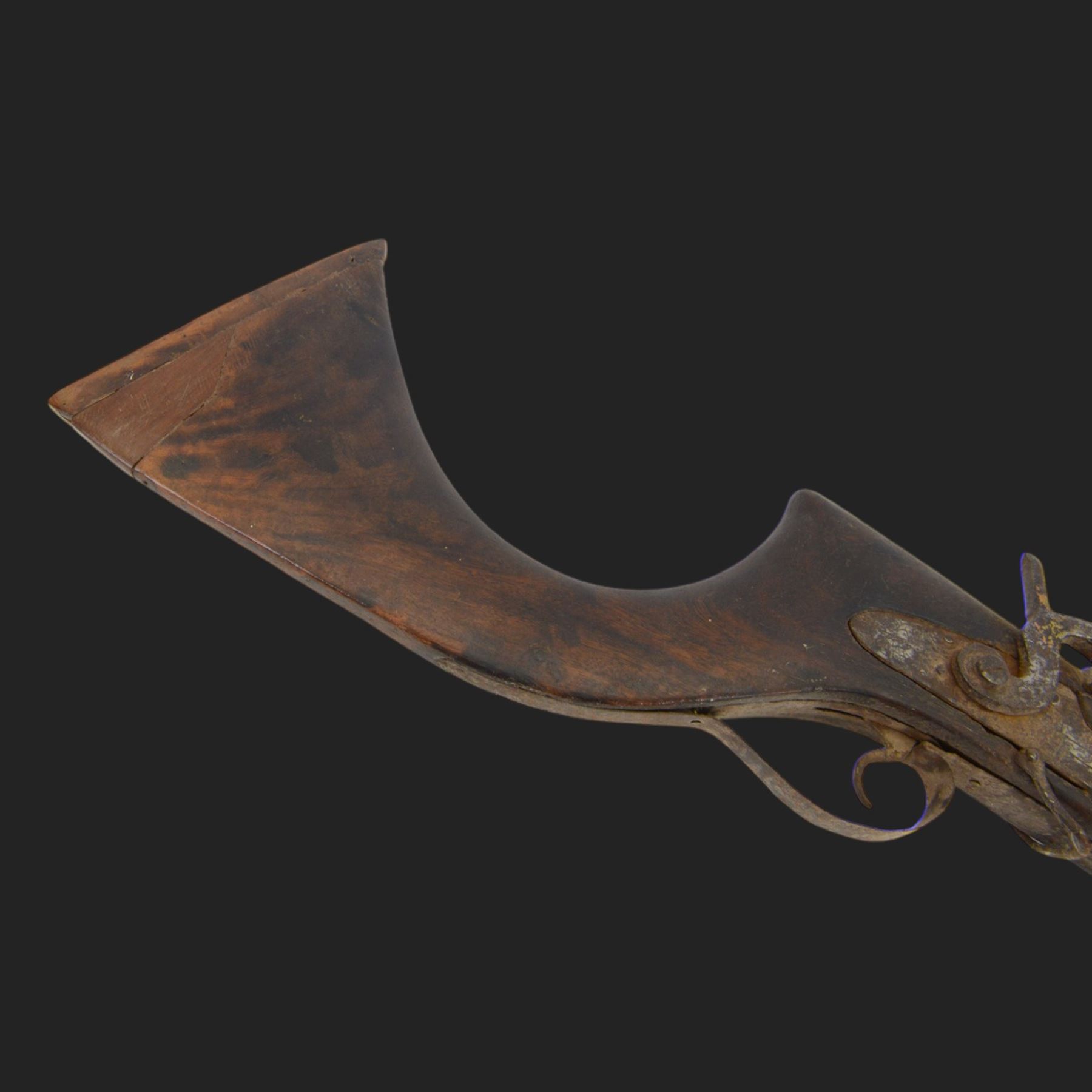 Middle Eastern percussion cap rifle, the 107cm  barrel with four brass bands and ramrod under, overall L143cm, together with another percussion rifle the 106cm barrel a copy of a 17th century Spanish barrel, complete with fake stamp, by vendors repute this rifle was confiscated from tribesmen in Kurdistan by police
Sold as an exempt item under Section 58 (2) of the 1968 Firearms Act, to be held as a curiosity or ornament