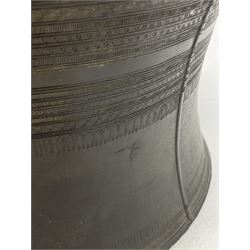 Dong Son style Southeast Asian bronze rain drum, the top decorated with concentric bands with stylised motifs and geometric shapes, central twelve point star, the tapered body with loop handles, the top set with animal figures