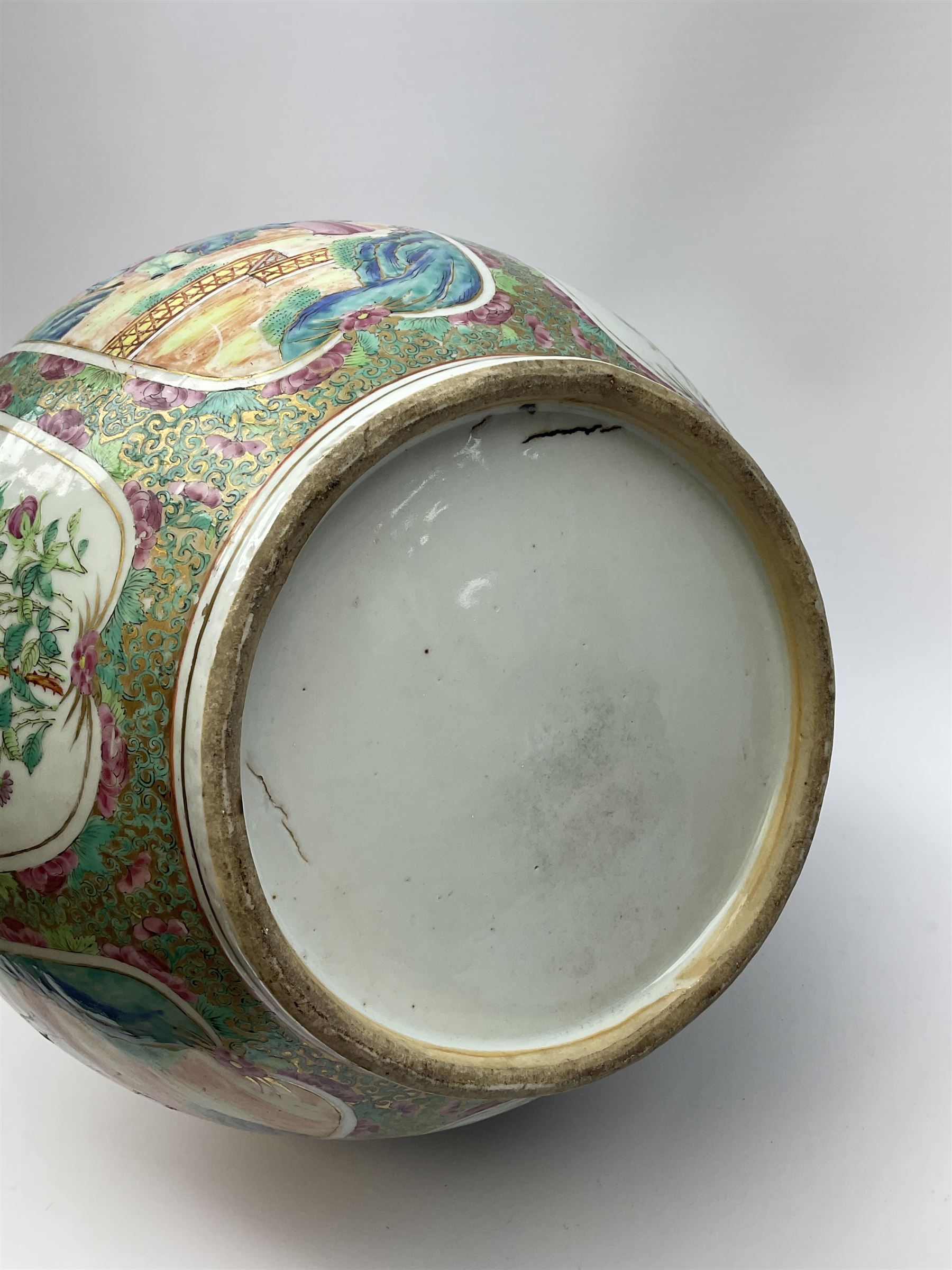 A 19th century Chinese Canton Famille Rose vase, of globular form with tall neck, and cover with finial, decorated with alternating panels of figural scenes, and birds and butterflies amongst blossoming and fruiting trees, with foliate surround against gilt, overall H57cm. 