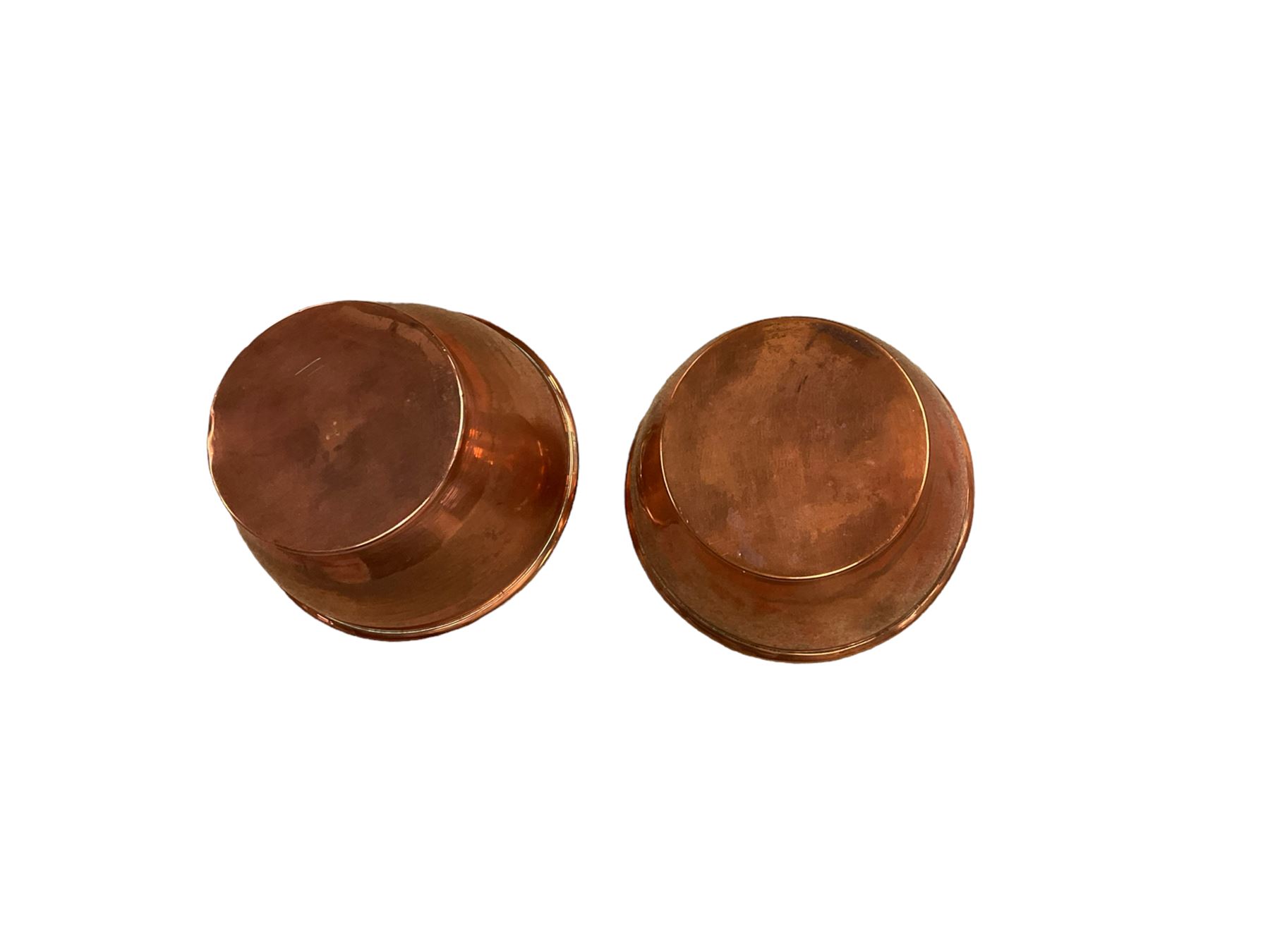 Two coppers pots, decorated in relief with water lilies, H8cm