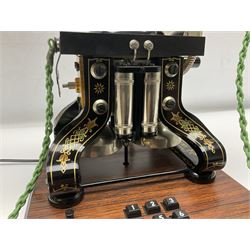 LM Ericsson of Sweden reproduction skeletal telephone, commemorating the centenary of the first 'Tax' in 1892, with gilded details on square walnut base with keypad and brass plaque beneath numbered 1892-09305, H35cm
