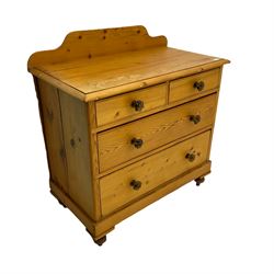 Victorian pine chest, fitted with two short and two long drawers, raised back