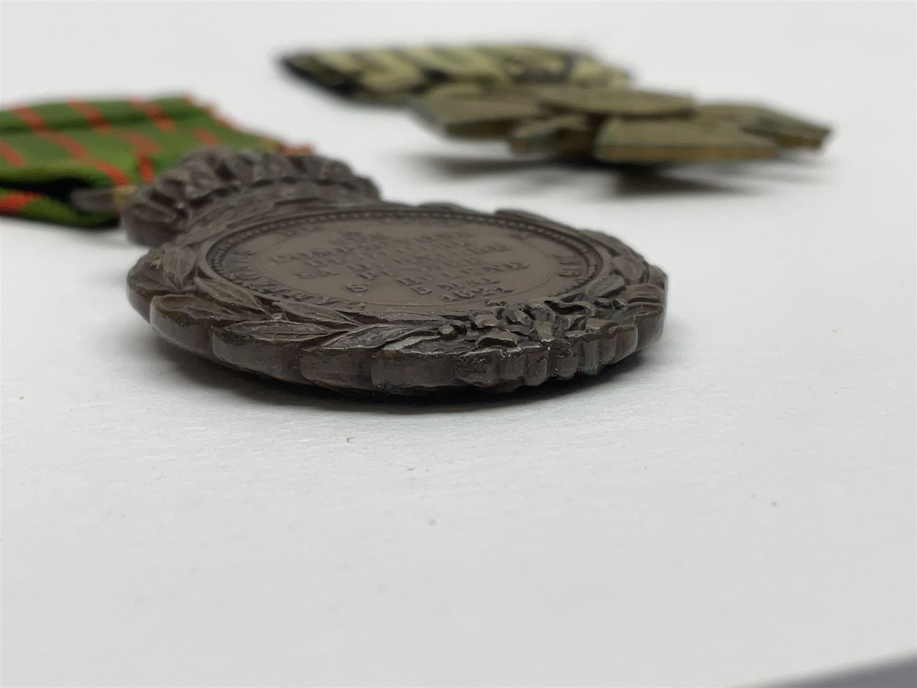 Four French medals - St. Helena medal with bust of Napoleon to obverse and inscription to reverse 'Campagnes de 1792 a 1815. A ses compagnons de gloire sa derniere pensée Ste. Hélène 5 Mai 1821', established by Emperor Napoleon III in 1857; two WW2 Croix-de-Guerre; and WW2 Croix-du-Combattant; all with ribbons (4)